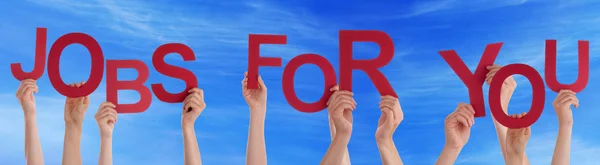 Händer som håller röda ordet jobb för dig blå himmel — Stockfoto