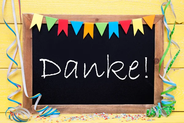 Chalkboard With Party Decoration, Text Danke Means Thank You ロイヤリティフリーのストック写真