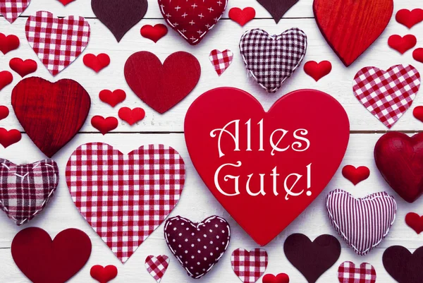 Textura de corazón rojo con Alles Gute significa los mejores deseos — Foto de Stock