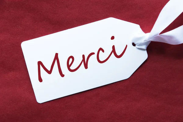 One Label On Red Background, Merci Means Thank You — Stock Photo, Image