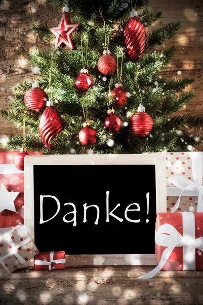 Árbol de Navidad con efecto Bokeh, Danke significa Gracias Imagen De Stock