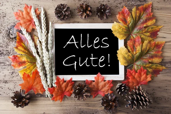 Tableau noir avec décoration d'automne, Alles Gute signifie meilleurs vœux — Photo