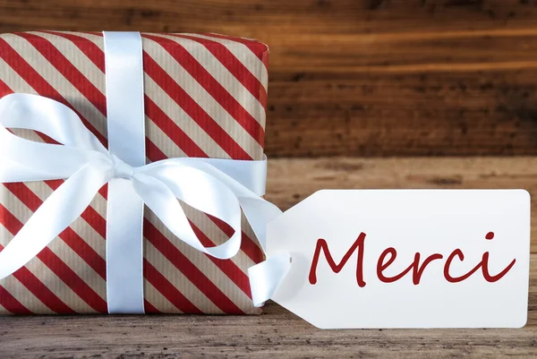 Present With Label, Merci Means Thank You — Stock Photo, Image