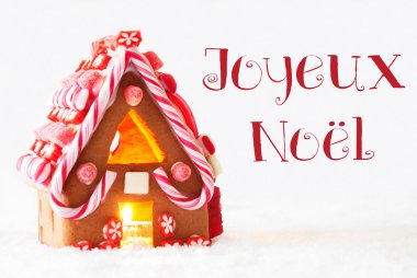 Gingerbread House, beyaz arka plan, Joyeux Noel mutlu Noeller anlamına gelir.
