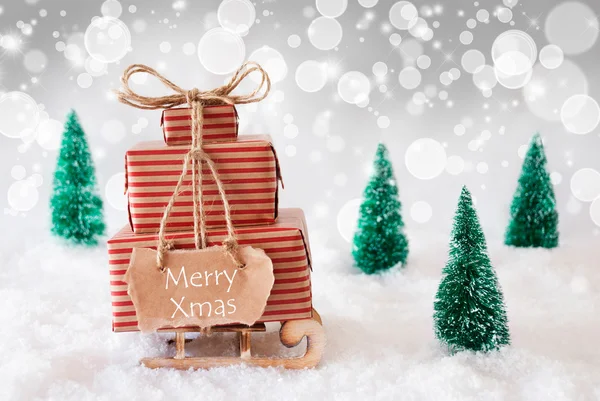 Weihnachtsschlitten auf weißem Hintergrund, frohe Weihnachten — Stockfoto