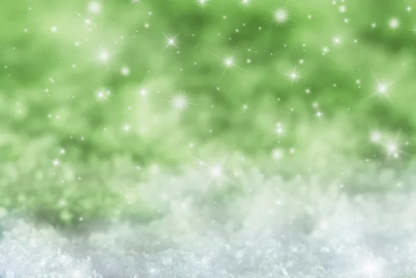 Fundo verde do Natal com neve e estrelas — Fotografia de Stock