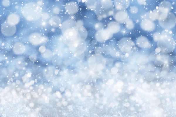 Kék karácsonyi háttér a hó, a Snwoflakes, a Bokeh és a csillagok — Stock Fotó