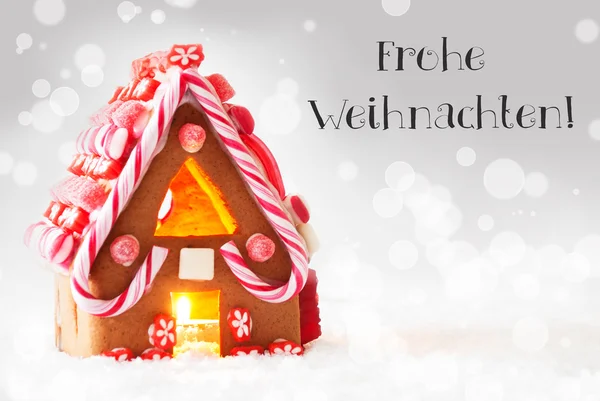 Casa de jengibre, fondo de plata, Frohe Weihnachten significa Feliz Navidad —  Fotos de Stock