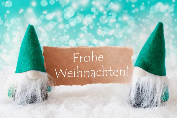 Gnomi turchesi con carta, Frohe Weihnachten significa Buon Natale — Foto Stock