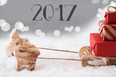 Ren geyiği ile kızak, Gümüş arka plan, metin 2017