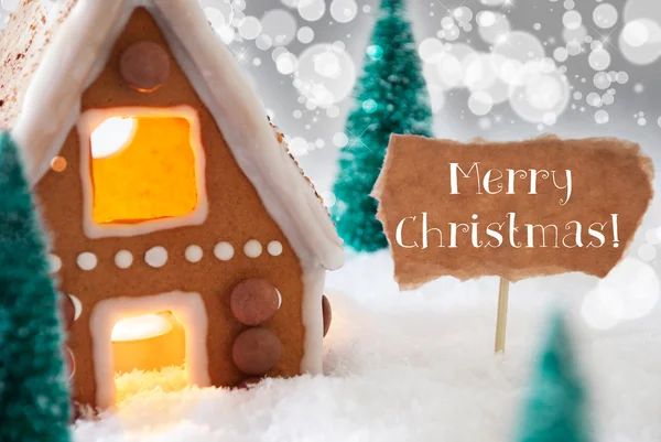 Peperkoek huis, zilveren achtergrond, tekst Merry Christmas — Stockfoto
