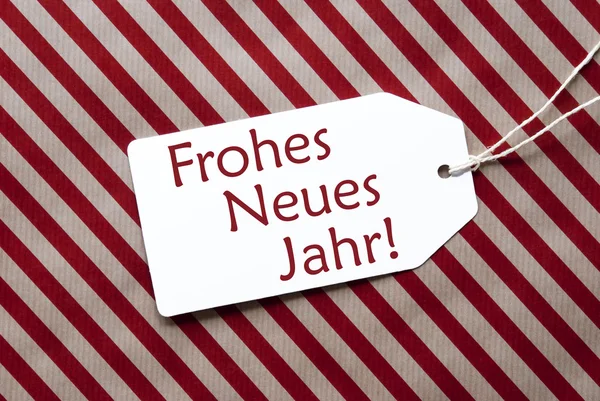 Címke a piros papír, Neues Jahr eszközök boldog új évet — Stock Fotó