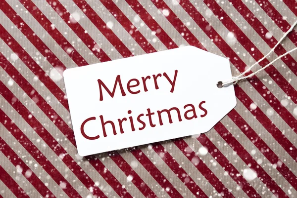 Etikett auf rotem Papier, Schneeflocken, Text Frohe Weihnachten — Stockfoto