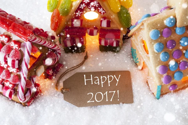 Барвисті пряники Будинок, сніжинки, текст щасливі 2017 — стокове фото
