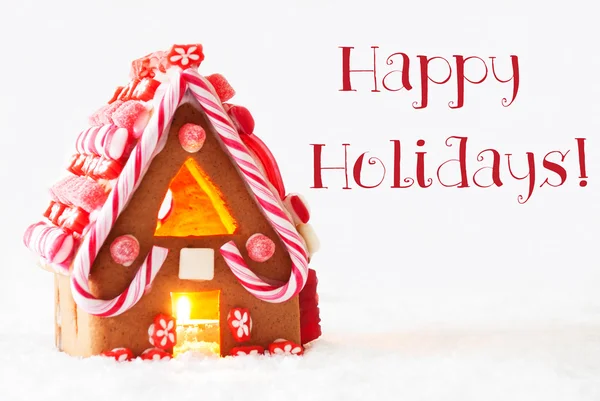 Lebkuchenhaus, weißer Hintergrund, Text frohe Feiertage — Stockfoto