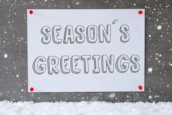 Etiqueta en la pared del cemento, Copos de nieve, Saludos de temporada de texto — Foto de Stock