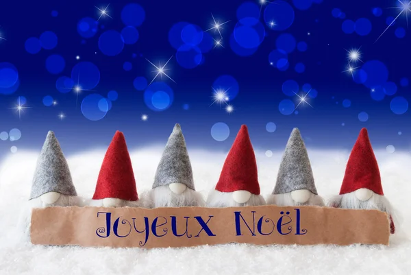 Skřítci, modré Bokeh, hvězdy, Joyeux Noel znamená Veselé Vánoce — Stock fotografie
