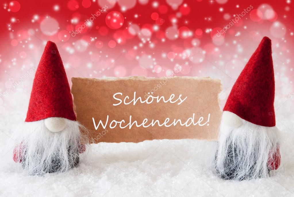 Rote weihnachtszwerge mit karte, schoenes wochenende bedeutet