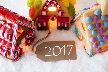 Renkli kurabiye evi, kar, metin 2017