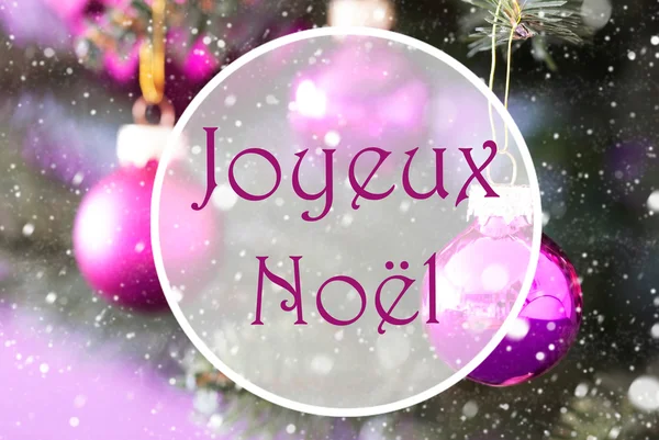 Rosenquarzkugeln, joyeux noel bedeutet frohe Weihnachten — Stockfoto