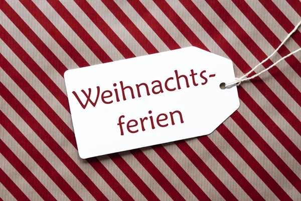 Етикетки на червона, обгорткового паперу, Weihnachtsferien засоби Різдва перерва — стокове фото