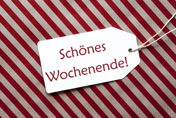 Label On Red Wrapping Paper, Schoenes Wochenende Means Happy Weekend — Stock Photo, Image