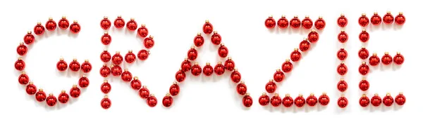 Adorno rojo de la bola de Navidad Building Word Grazie significa gracias — Foto de Stock