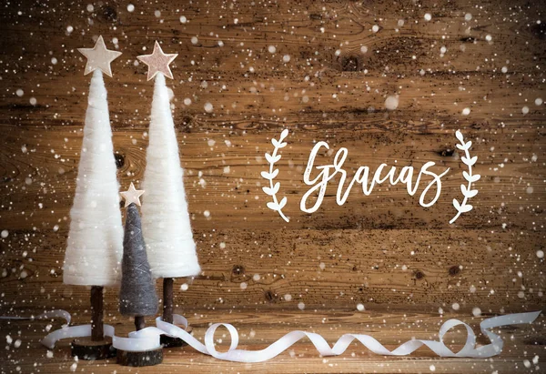 White Christmas Tree, Wooden Background, Gracias Means Thank You, Snowflakes — стокове фото