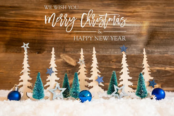 Arbre, neige, étoile bleue, joyeux Noël et bonne année, fond en bois — Photo