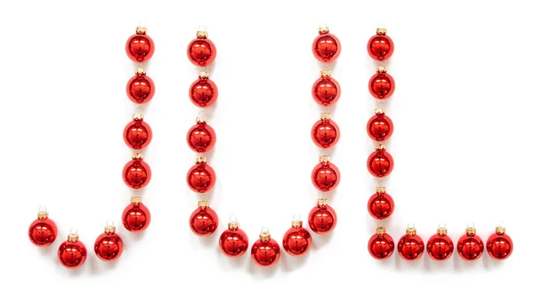 Röd julkula prydnad byggnad juli innebär jul — Stockfoto