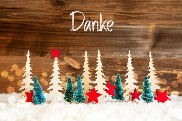 Árvore de Natal, Neve, Estrela Vermelha, Danke significa obrigado, Fundo de madeira — Fotografia de Stock