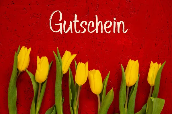 Yellow Tulip Flowers, Red Background, Text Gutschein Means Voucher — Stock Photo, Image