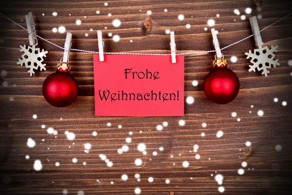 Frohe weihnachten на червоного прапора на снігу — стокове фото