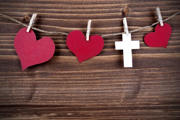 Hearts and a Cross on a Line — Stock Photo, Image