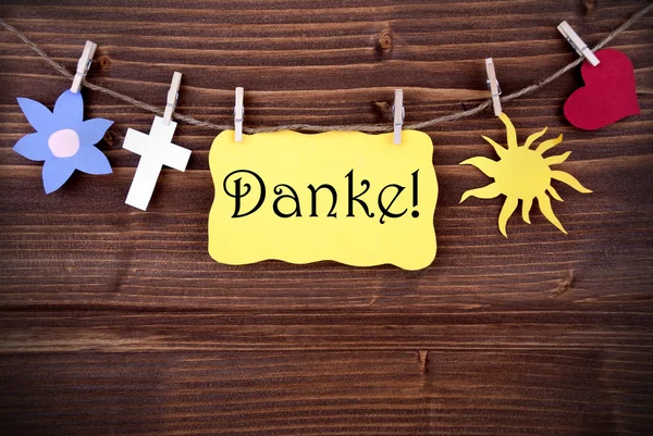 Баннер с Данке и различными символами на линии — стоковое фото