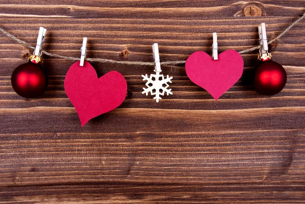 Empty Heart Tags and Christmas Decoration on a Label — Stock Photo, Image