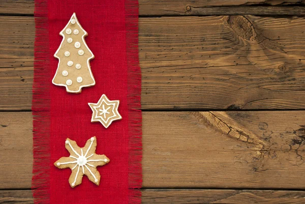 Sterne und Christbaum-Lebkuchen als Hintergrund — Stockfoto