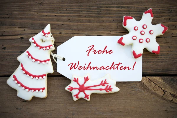 Red Frohe Weihnachten на белой этикетке — стоковое фото