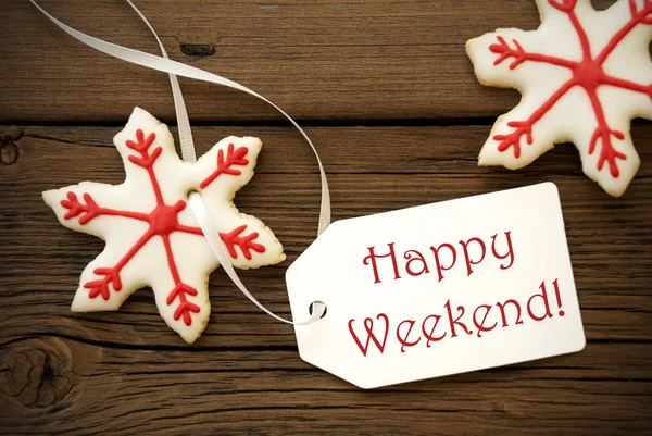 Cookies de estrela de Natal com etiqueta de fim de semana feliz — Fotografia de Stock
