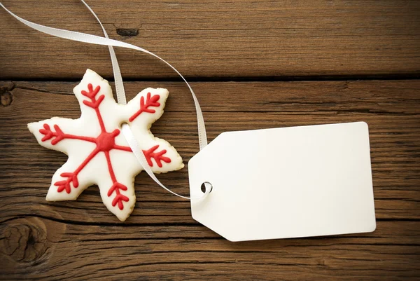 Biscoito de estrela de Natal com etiqueta vazia — Fotografia de Stock