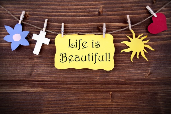 Etiqueta amarilla diciendo que la vida es hermosa — Foto de Stock