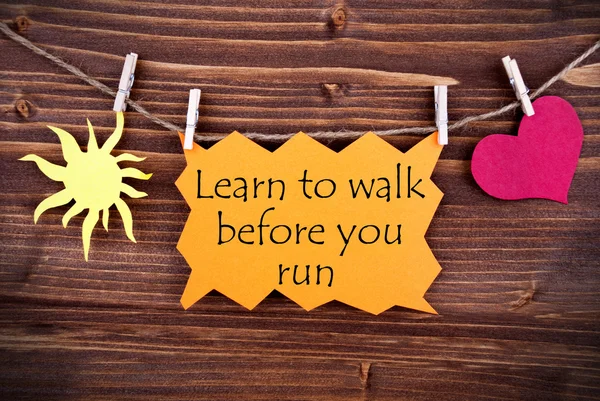 Orange Label With Life Quote Learn To Walk Before You Run — Stock Photo, Image