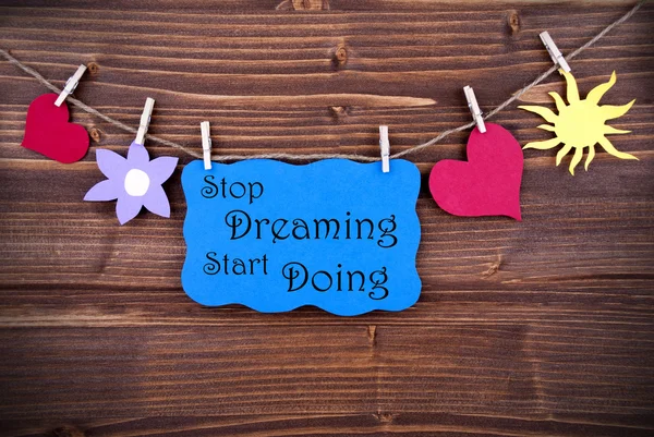 Blue Label with Life Quote Stop Dream Start Doing — стоковое фото