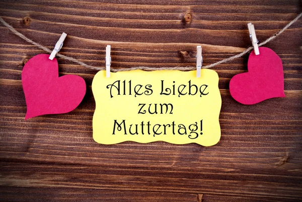 Etiqueta amarilla con Alles Liebe Zum Muttertag — Foto de Stock