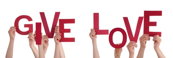 Människor händer som håller röda ord ge kärlek — Stockfoto