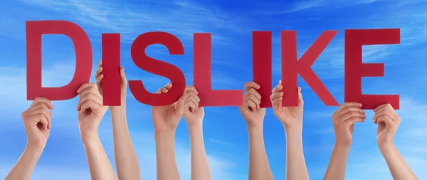 Mnoho lidí ruce držící červená rovnou slovo nelíbí Blue Sky — Stock fotografie