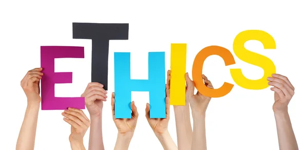 Många människor händer med färgglada ordet etik — Stockfoto