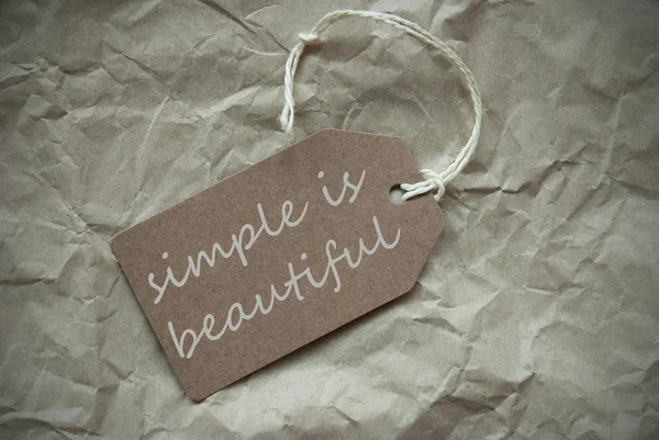 Beige Label With Quote Simple Is Beautiful Paper Background — Stock Photo, Image