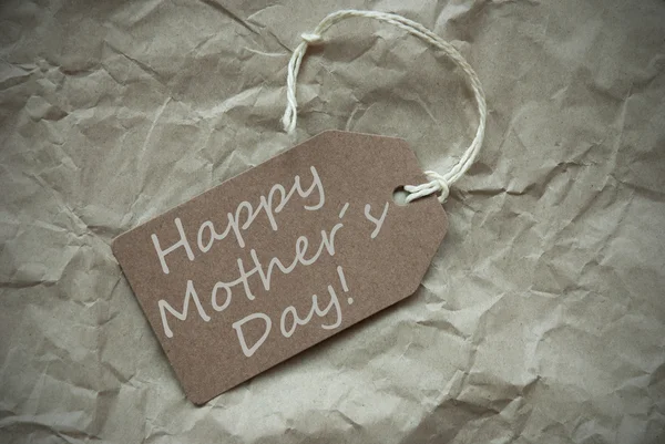 Beige etikett med glada mammor dag papper bakgrund — Stockfoto