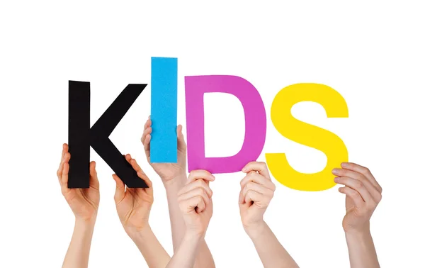 Muitas pessoas mãos segurando crianças coloridas palavra — Fotografia de Stock
